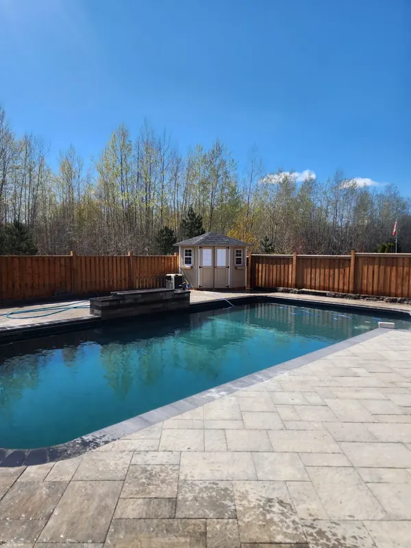 Inground pool with paver deck