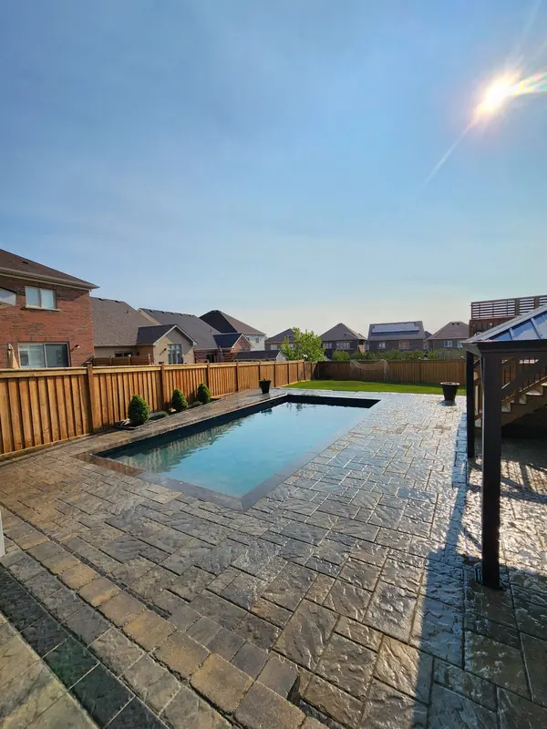 Pool with patio and gazebo