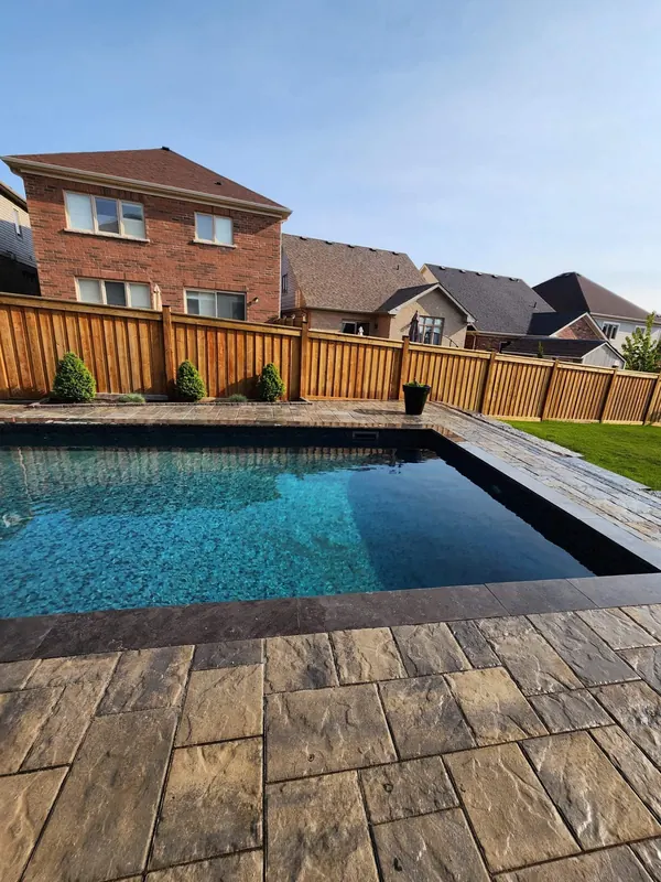 Backyard pool with paver deck
