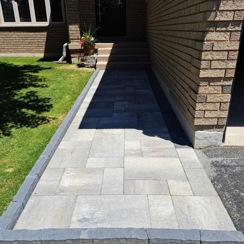 Interlock walkway alongside the house