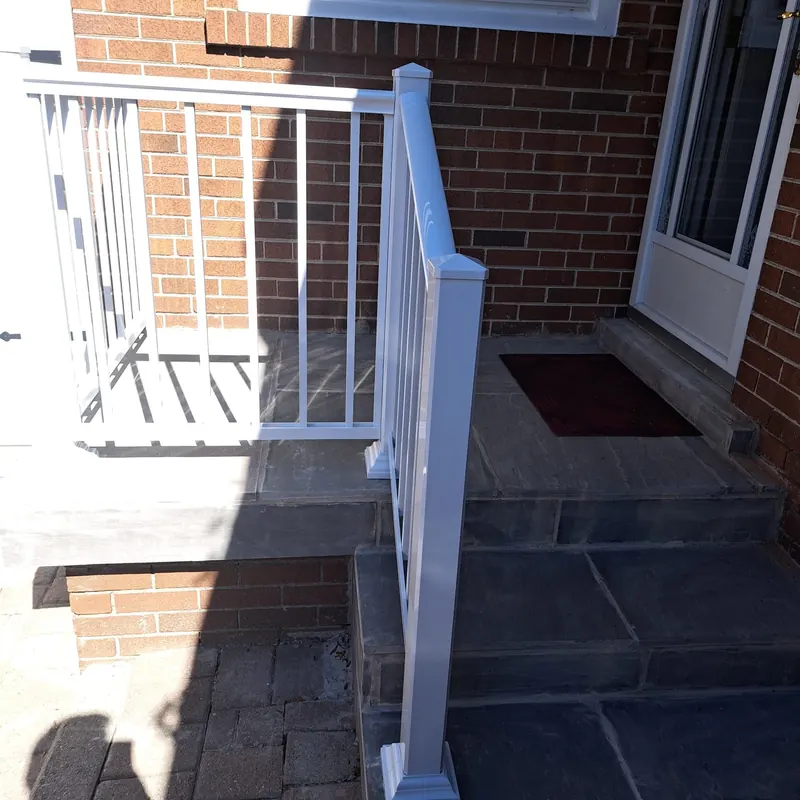 Flagstone porch and steps with railing