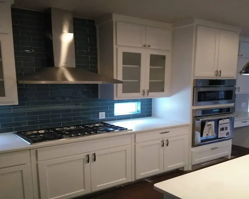 Renovated kitchen with island and custom cabinetry